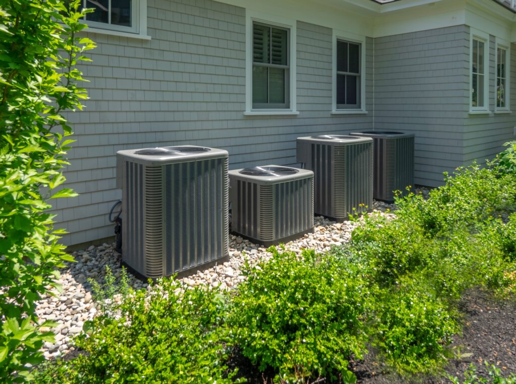 two big HVAC units and one small HVAC unit