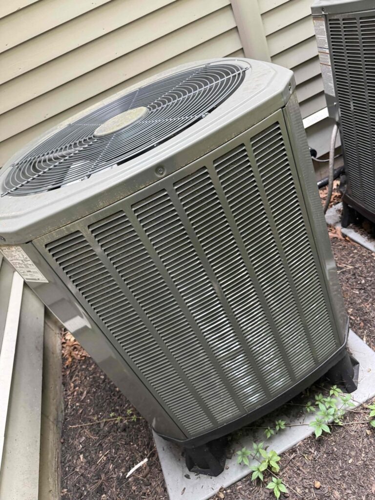 HVAC & Plumbing in Dover, MA 15 Trane outdoor AC unit at a Dover, MA home during a tune-up