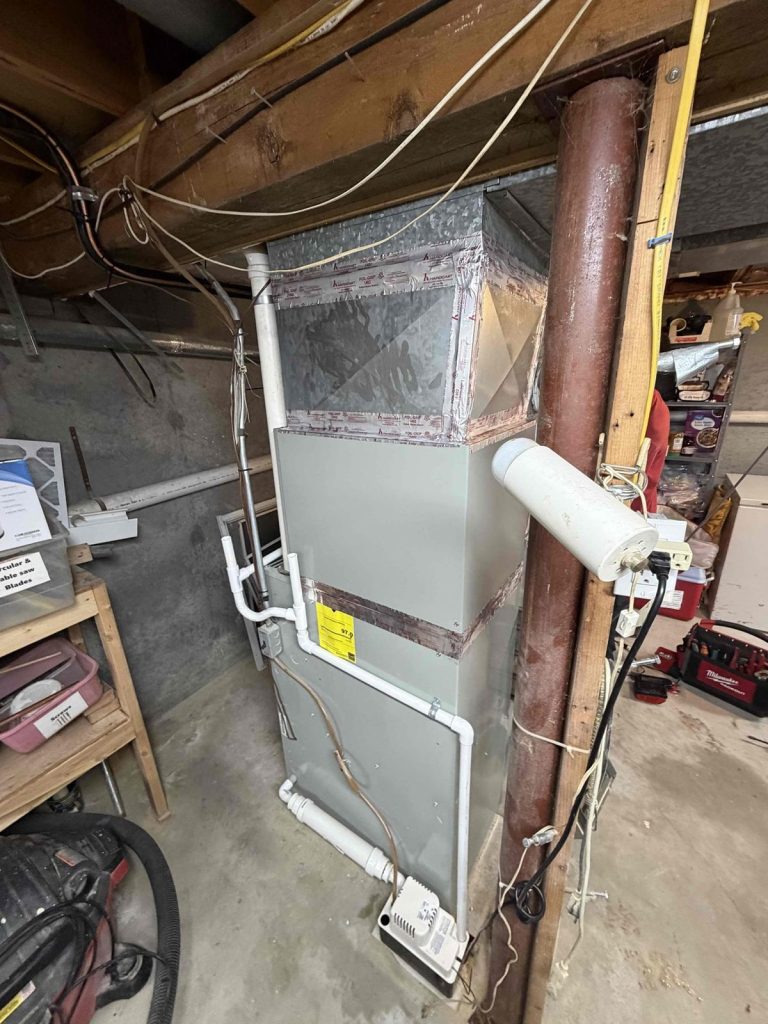 HVAC & Plumbing in Medfield, MA 12 Furnace with a newly added cooling coil in a Medfield, MA basement