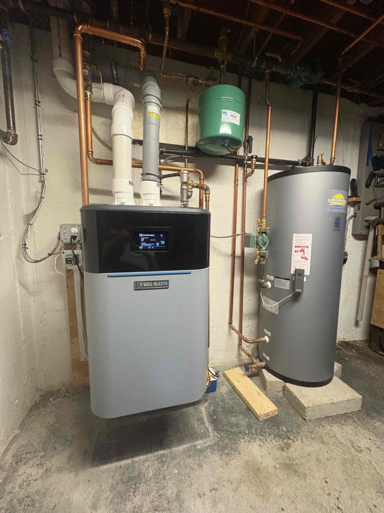 HVAC & Plumbing in Medfield, MA 15 Weil-McLain high efficiency gas boiler and indirect water heater in Medfield, MA