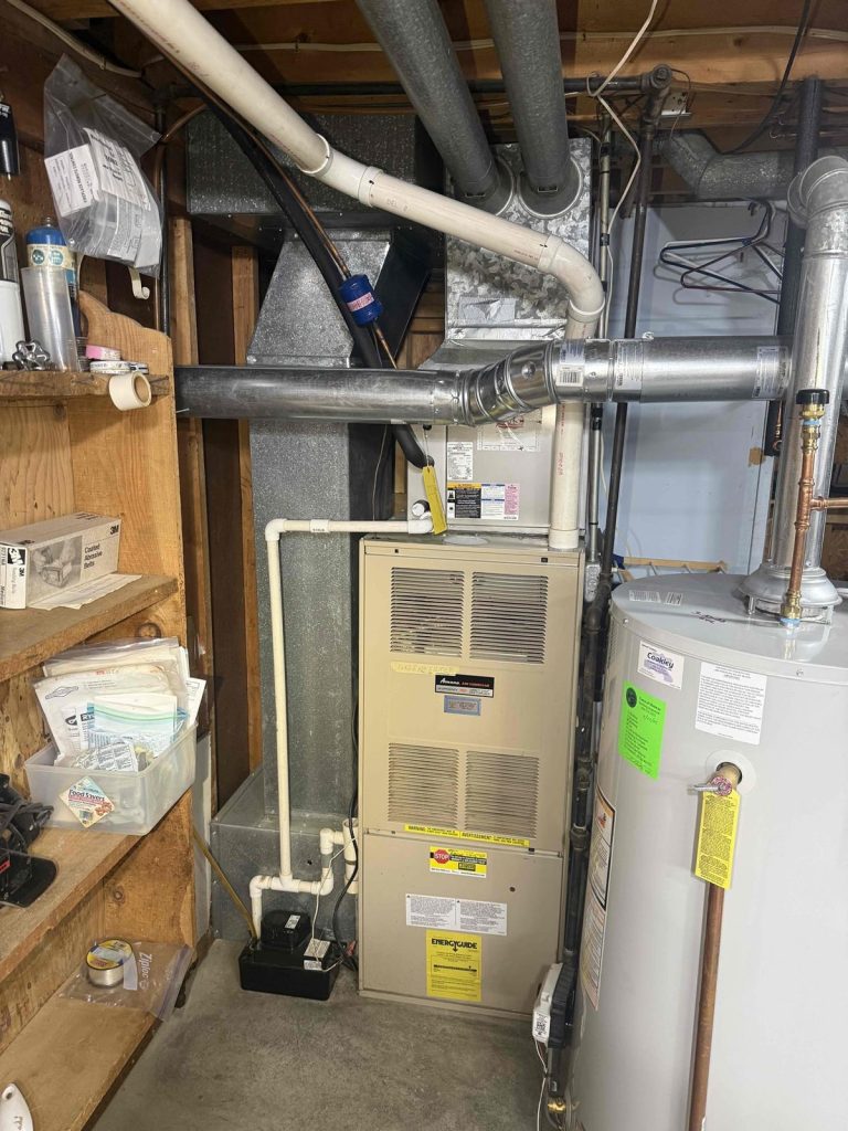 HVAC & Plumbing in Medway, MA 13 Old furnace in a Medway, MA basement before replacement