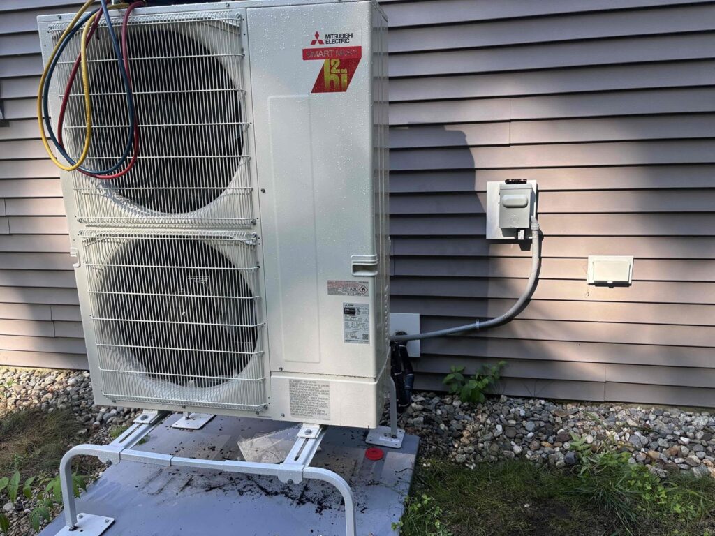 HVAC & Plumbing in Norfolk, MA 11 Mitsubishi multi-zone heat pump condenser installed at a Norfolk, MA home